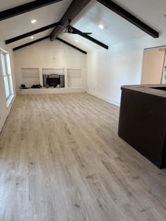 Living room with refinished wood plank floor